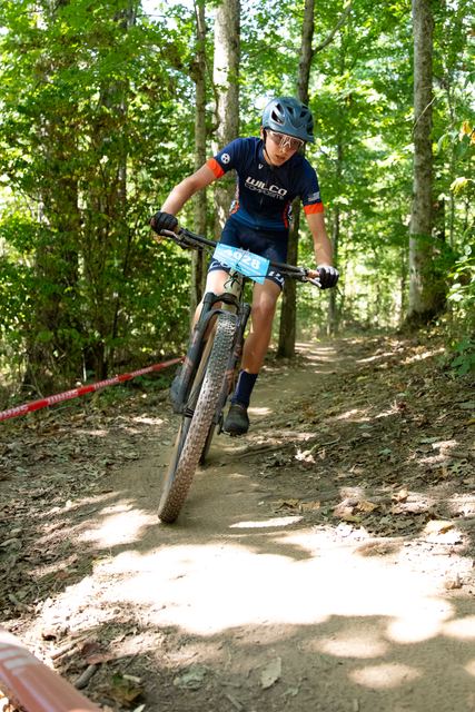 Dropping into a wooded berm