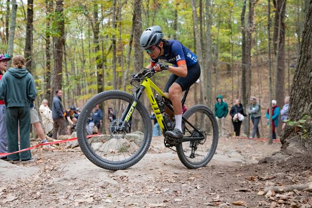 Popping the front wheel through the rock garden